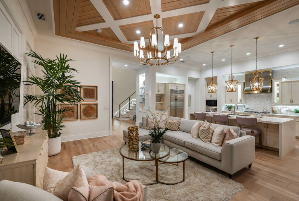 custom designed home with large living room and chandelier