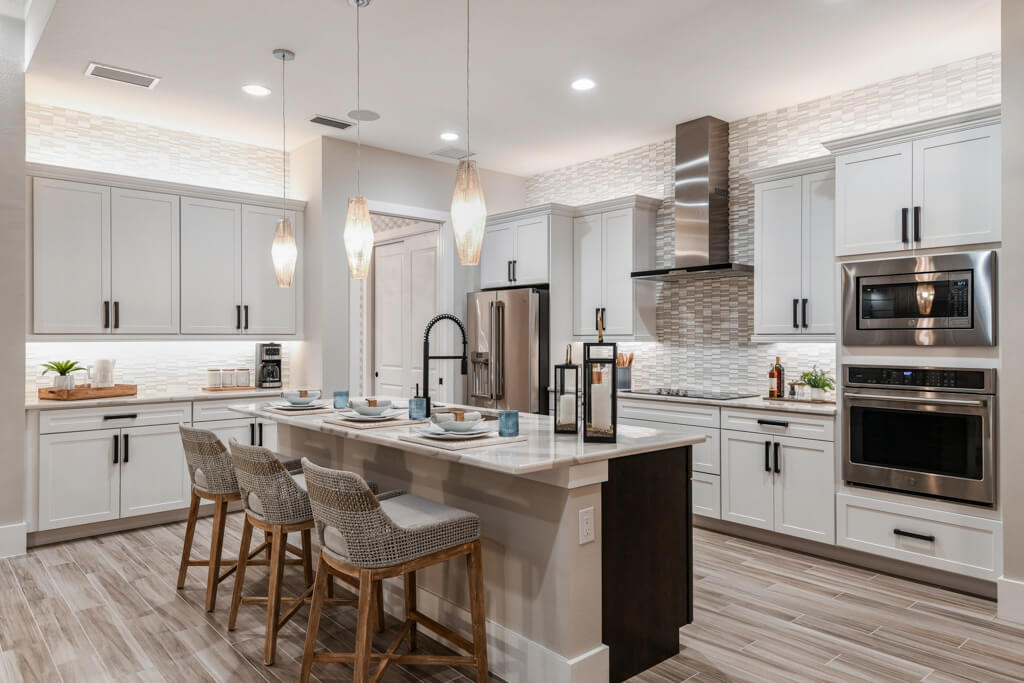 a custom home kitchen with large island and spacious floor plans