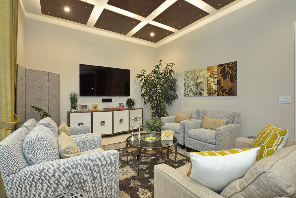a luxury living room in a home with a large seating area from a contemporary home builer