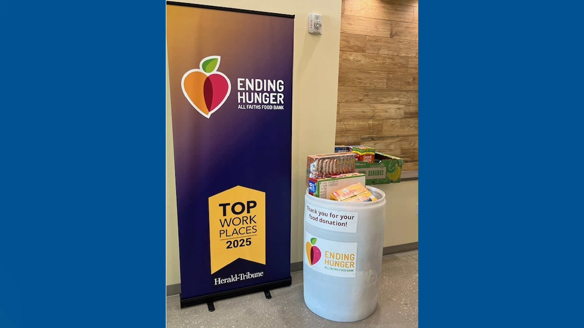 Ending Hunger banner with food donations and Top Workplaces 2025 logo.