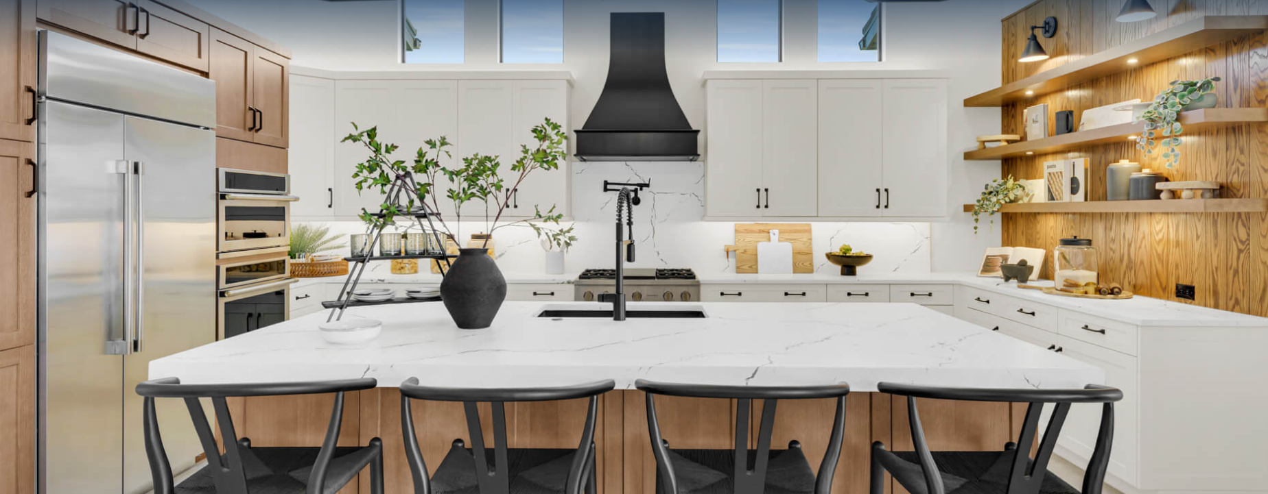 Bright modern kitchen with Cambria, open shelving, and matte black fixtures