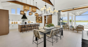 Open kitchen in a luxury home designed by custom home builder Lee Wetherington Homes.