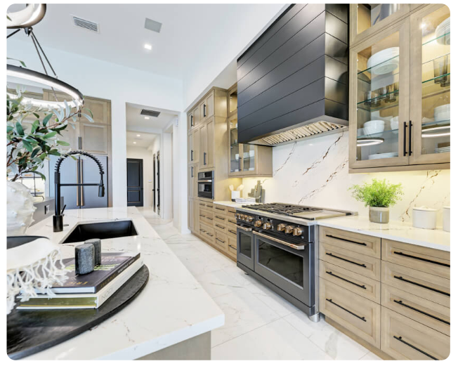 Luxury kitchen interior in a Florida custom home built by Lee Wetherington Homes showcasing premium finishes, cabinetry, and design craftsmanship.