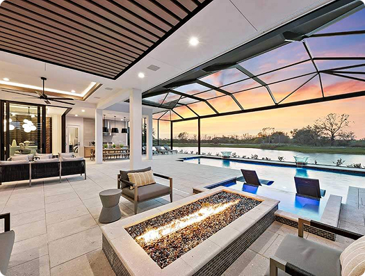 Luxury Florida custom home showcasing seamless indoor-outdoor flow with open living spaces, designed by Lee Wetherington Homes.