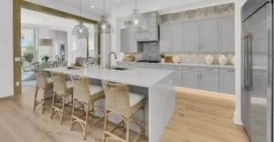Spacious kitchen with abundant natural light in a luxury home by custom home builder Lee Wetherington Homes.