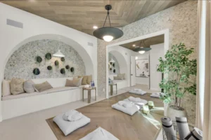 Modern custom yoga room designed by Lee Wetherington Homes featuring soft natural lighting, neutral finishes, and open space for wellness and relaxation.